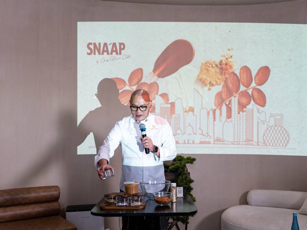 Chef Nouel giving a live demonstration of making Abu Dhabi chocolate.